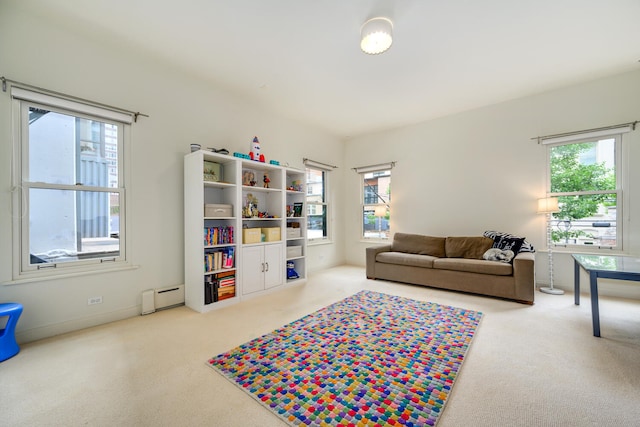 living room featuring carpet floors and a baseboard radiator