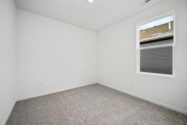 spare room with carpet floors