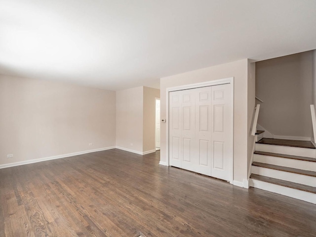 spare room with dark hardwood / wood-style flooring