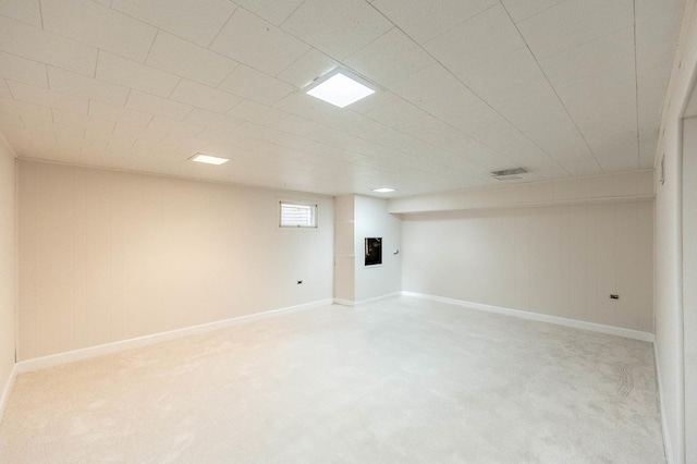 basement featuring carpet flooring