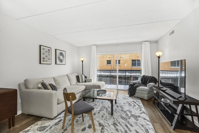 living room with dark hardwood / wood-style floors