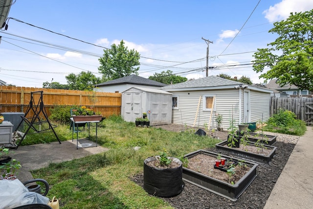 view of yard with a storage shed