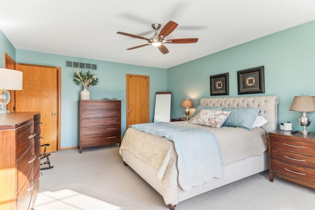 carpeted bedroom featuring ceiling fan