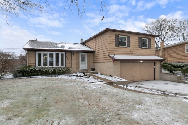 view of front of home with a garage