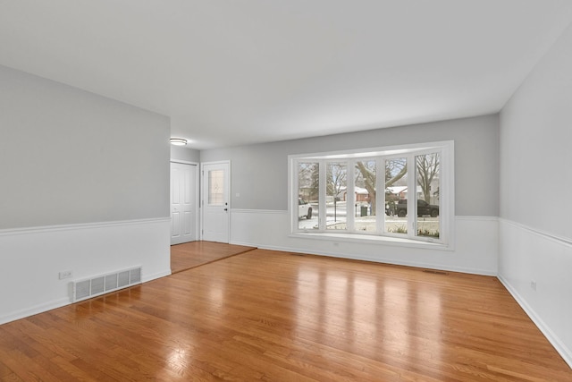 empty room featuring light hardwood / wood-style floors