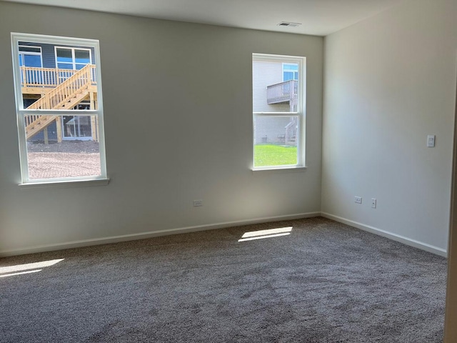 view of carpeted spare room