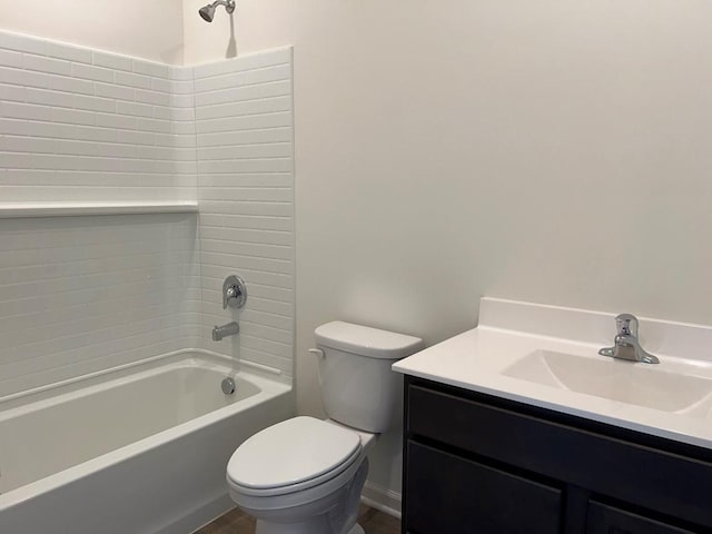 full bathroom featuring bathtub / shower combination, vanity, and toilet