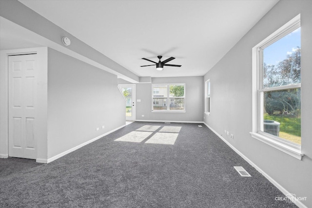 interior space featuring ceiling fan