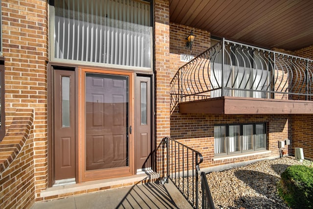 property entrance with a balcony