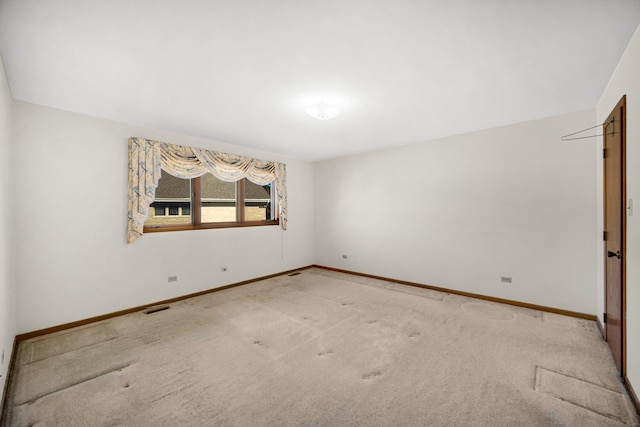 view of carpeted spare room