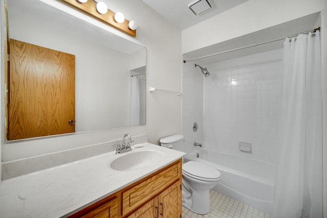 full bathroom featuring tile patterned flooring, shower / tub combo, vanity, and toilet