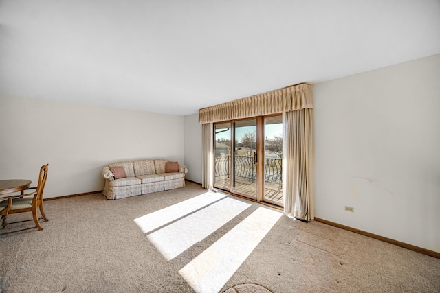 living room featuring light colored carpet