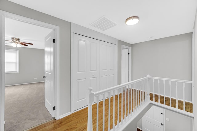 hallway featuring light wood-type flooring