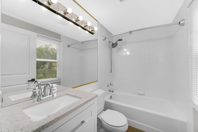 full bathroom with vanity, toilet, and shower / washtub combination