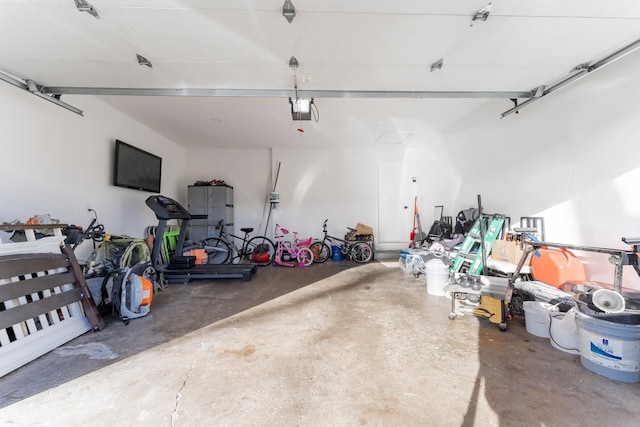 garage featuring a garage door opener