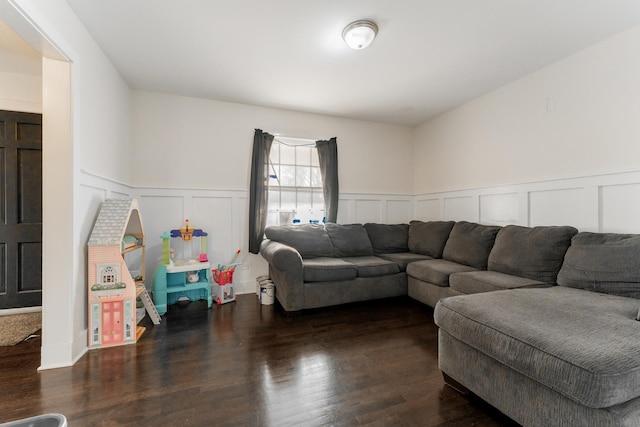 living room featuring dark wood-type flooring