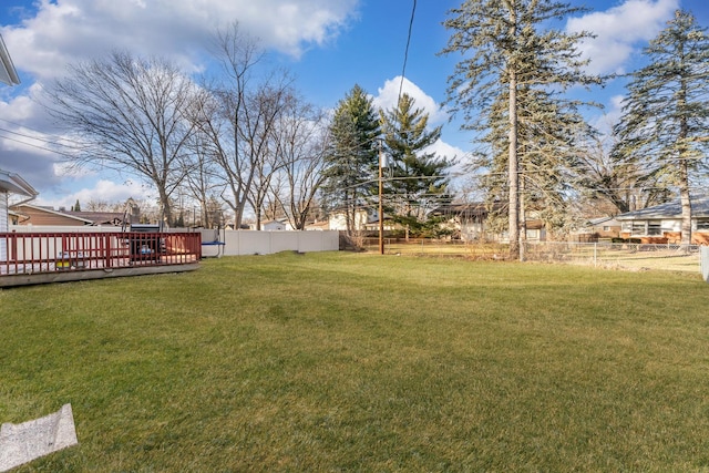 view of yard with a deck