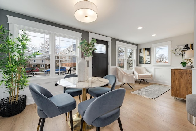 dining area featuring light wood-type flooring