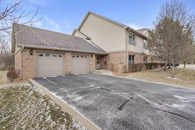 view of side of property featuring a garage