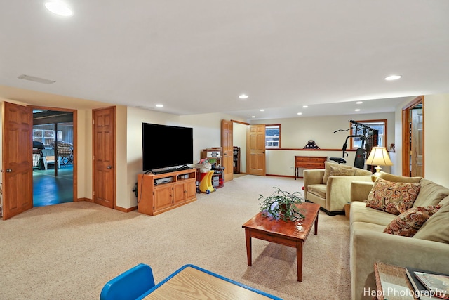 living room featuring light colored carpet