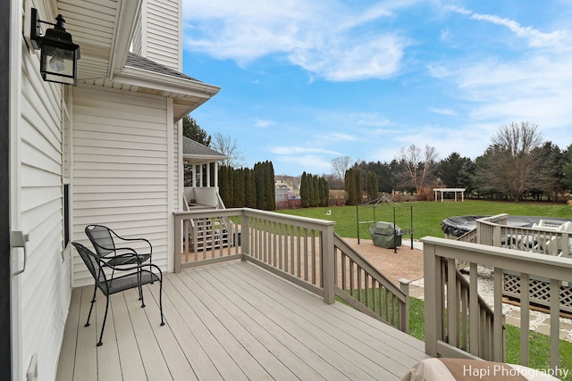 deck with a lawn and a grill