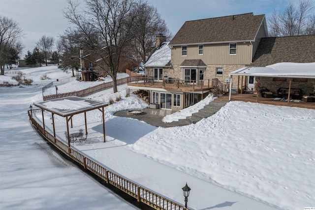 exterior space featuring a wooden deck