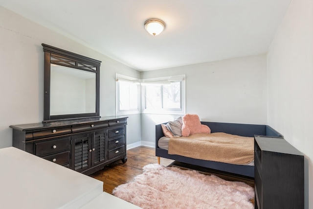 bedroom featuring dark hardwood / wood-style floors