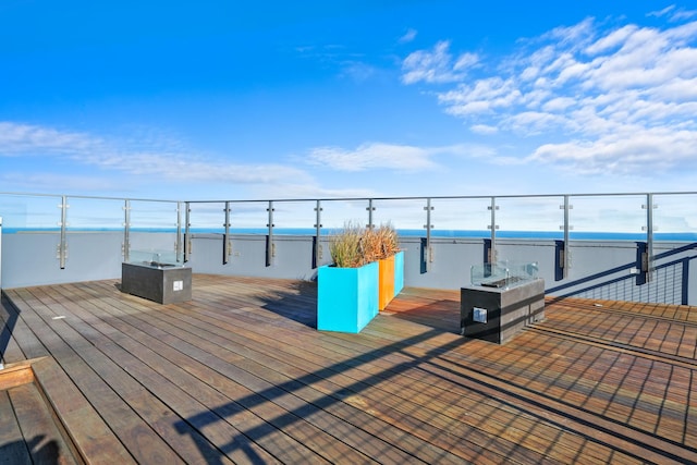 deck featuring a water view