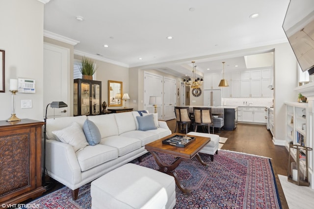 living room with ornamental molding and dark wood-type flooring