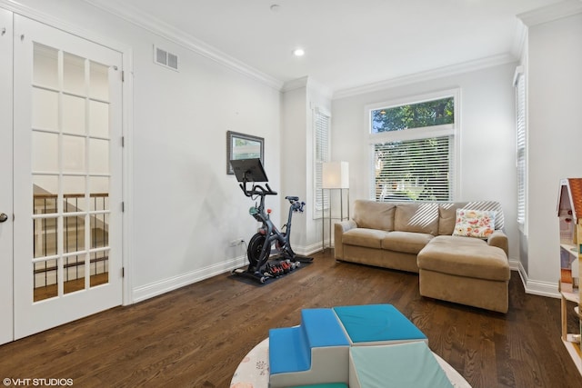 living room with ornamental molding and dark wood-type flooring