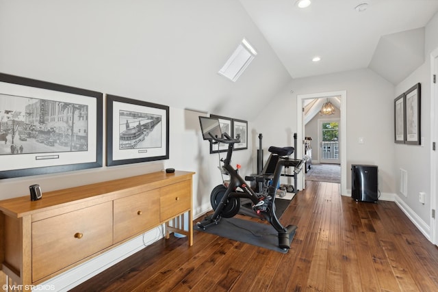 workout area with dark wood-type flooring and lofted ceiling