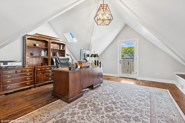 office area with dark wood-type flooring, vaulted ceiling, and an inviting chandelier