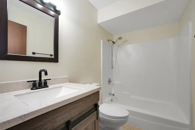 full bathroom featuring bathing tub / shower combination, vanity, and toilet