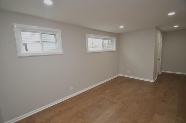 basement featuring hardwood / wood-style flooring