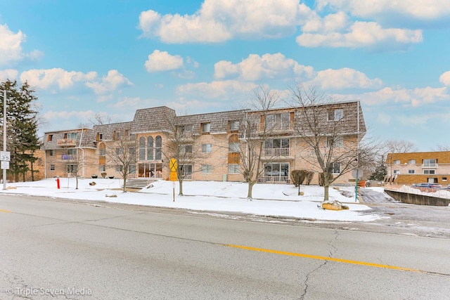 view of snow covered property