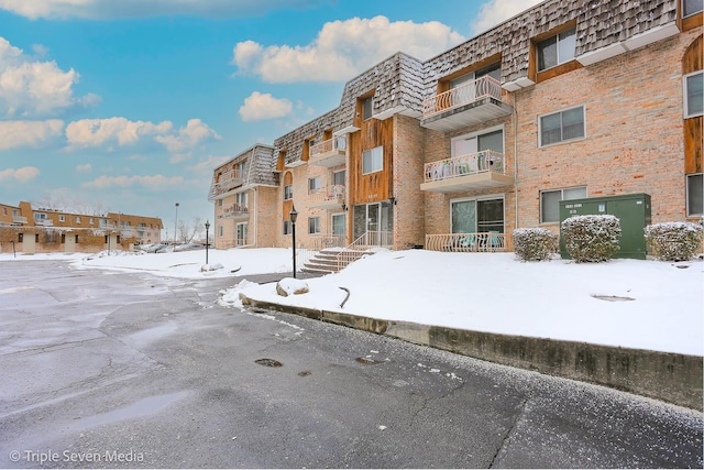 view of snow covered property