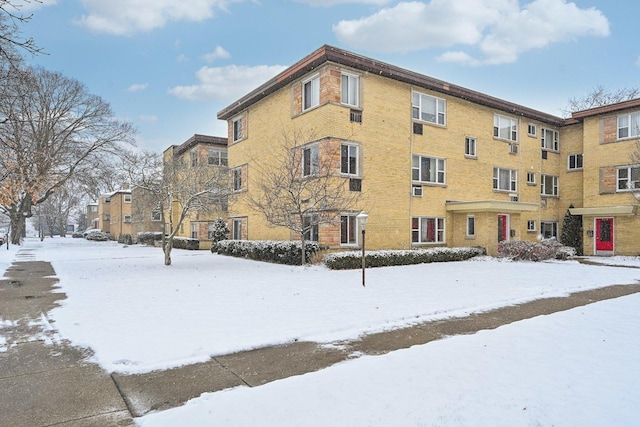 view of snow covered property