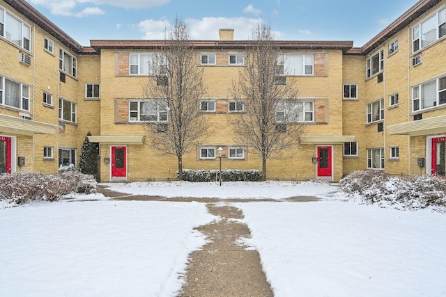 view of snow covered property