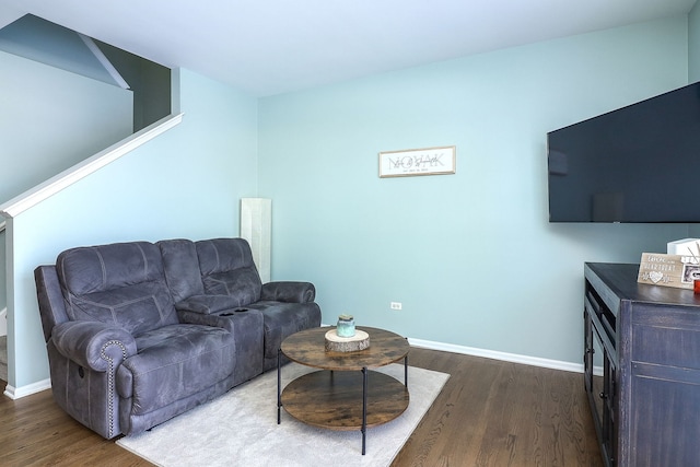 living room with dark wood-type flooring