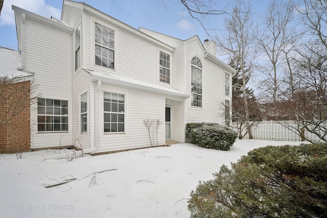 view of snow covered property