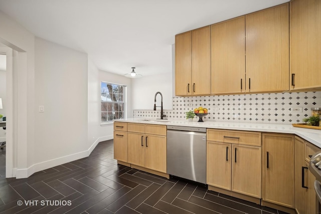 kitchen with kitchen peninsula, backsplash, sink, light brown cabinets, and dishwasher