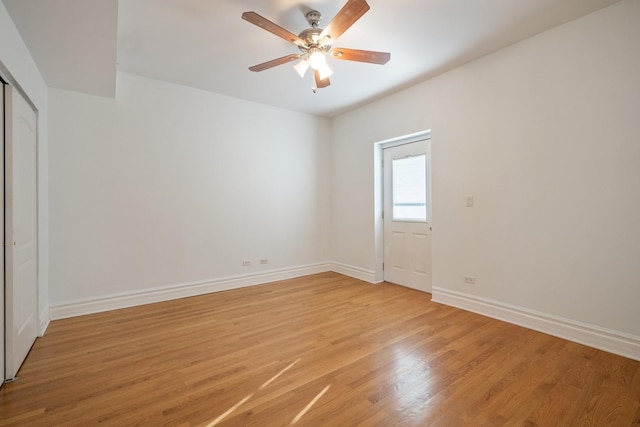 spare room with light hardwood / wood-style flooring and ceiling fan