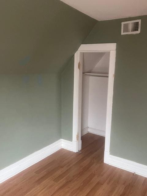 additional living space with light wood-type flooring