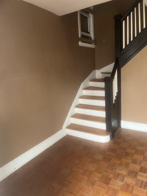 stairs with parquet flooring