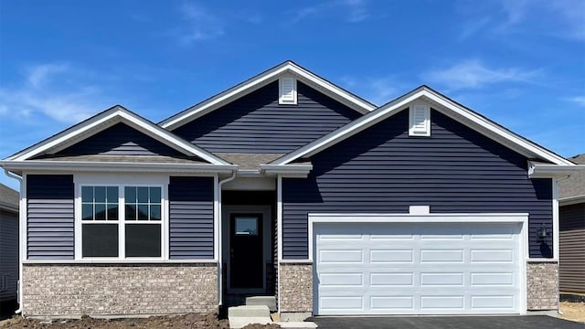 craftsman house with a garage