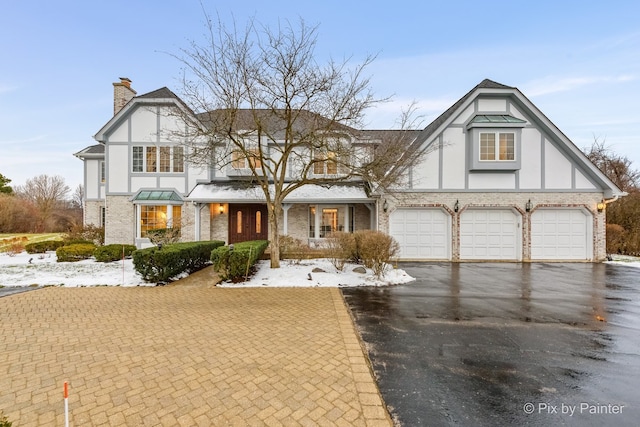 tudor house with a garage