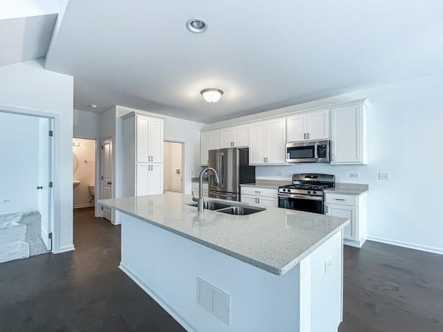 1575 Glenbrooke Ln, New Lenox, IL 60451 - kitchen with appliances with stainless steel finishes, white cabinets, a kitchen island with sink, light stone counters, and recessed lighting