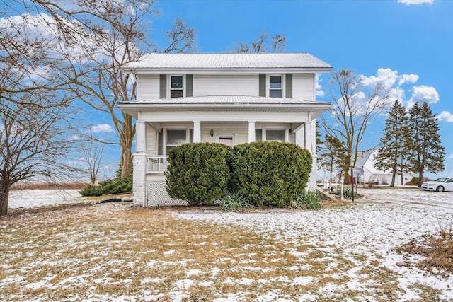 front of property featuring covered porch