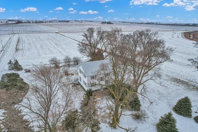 snowy aerial view with a rural view