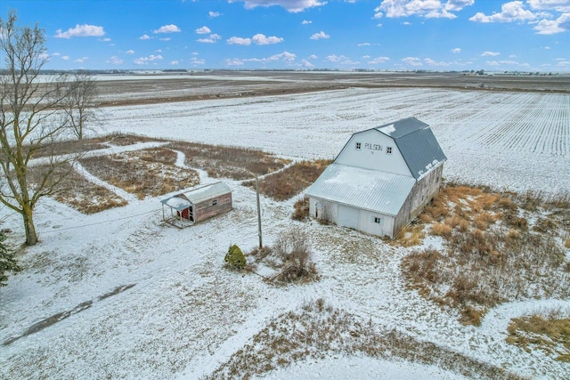 snowy aerial view with a rural view